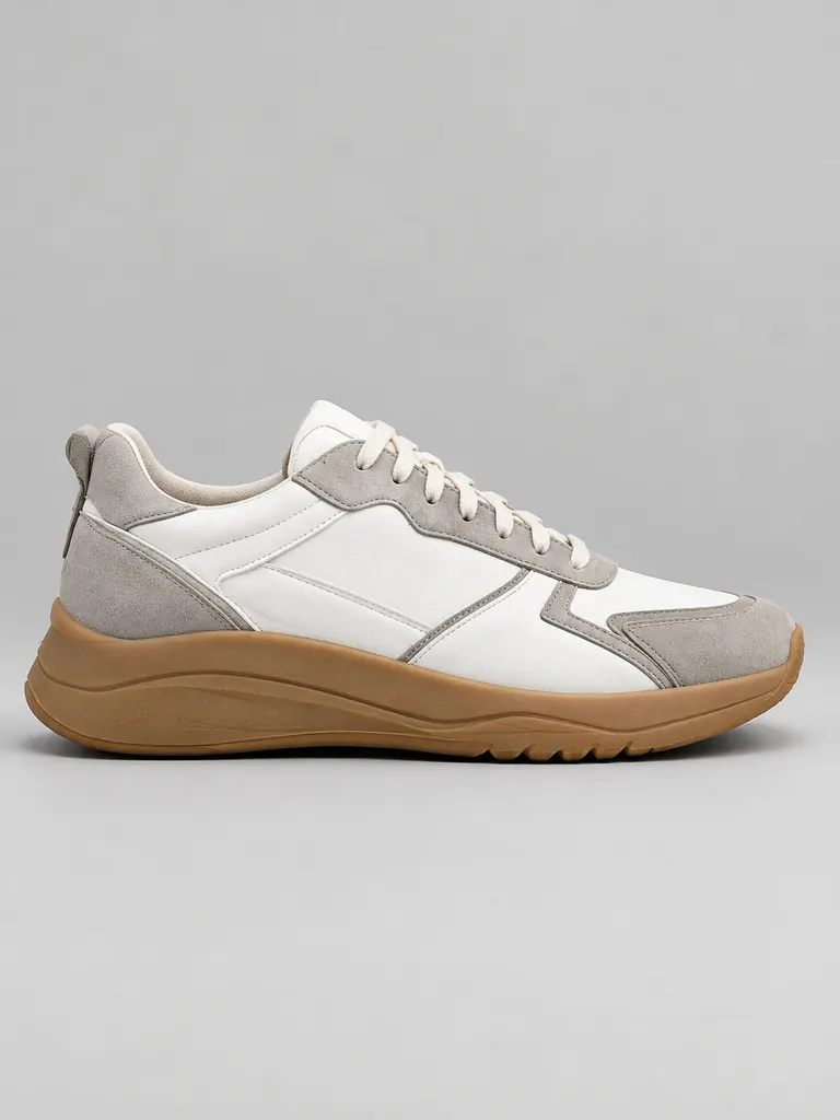 The sneaker design rendered as a realistic product photo in leather and suede